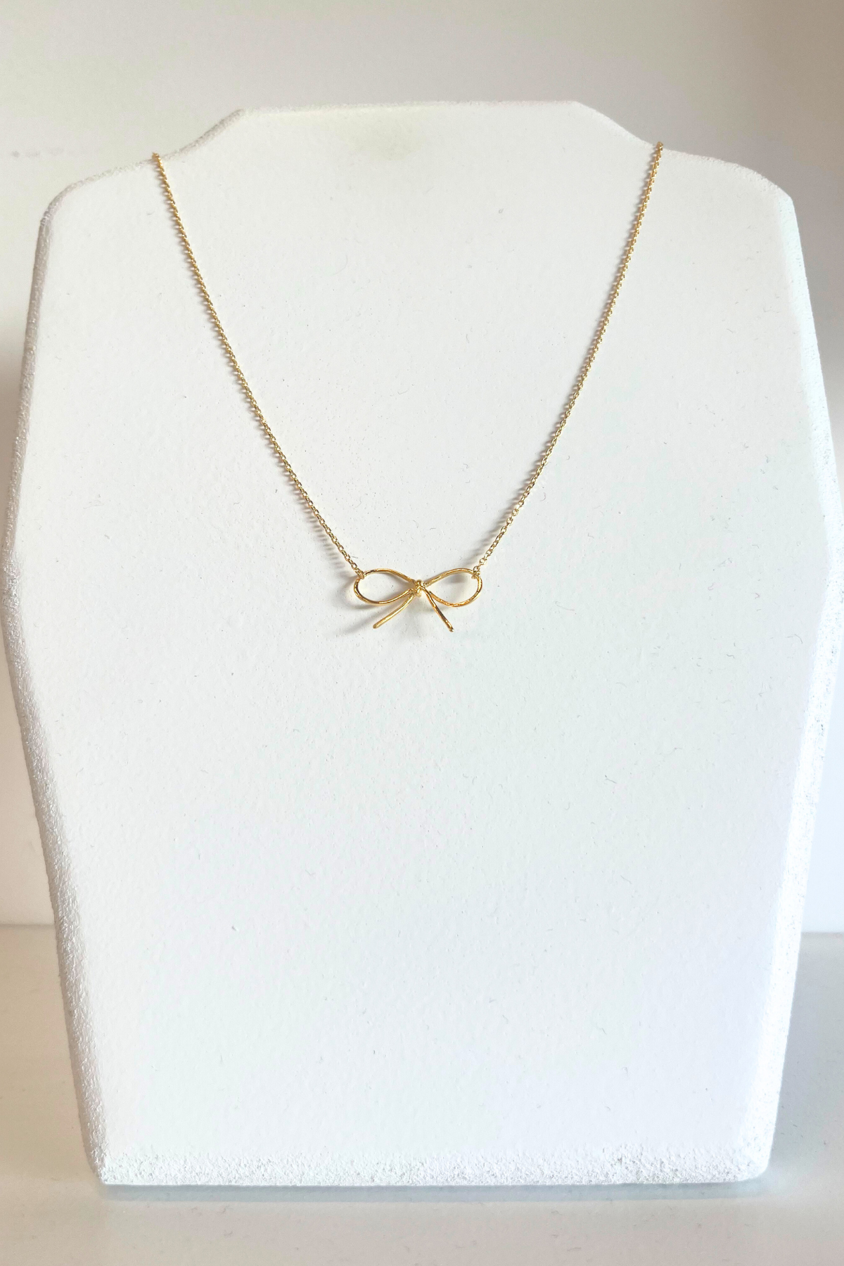 Gold Dipped Bow Necklace